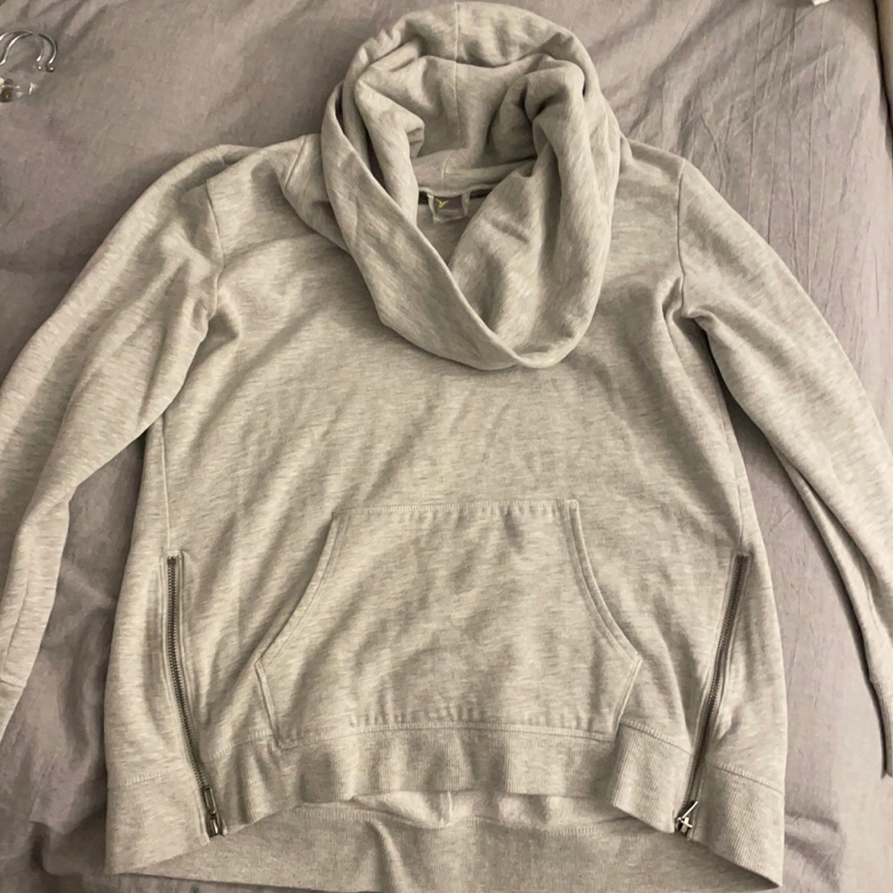 Old Navy Active gray waist length scoop neck sweater with side zips.